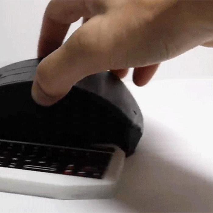 There's a Fully Working Computer, Including a Retractable Keyboard, Hidden Inside This Mouse