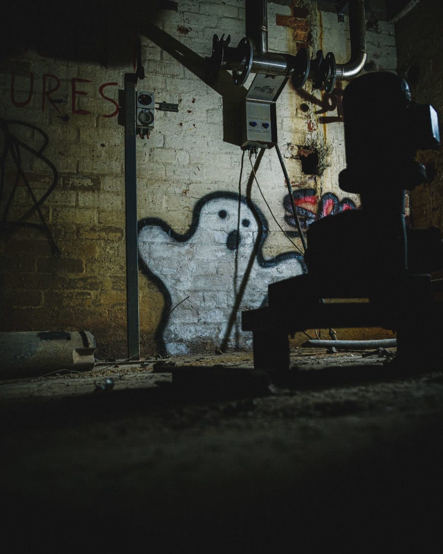 Spooky graffiti in abandoned factory