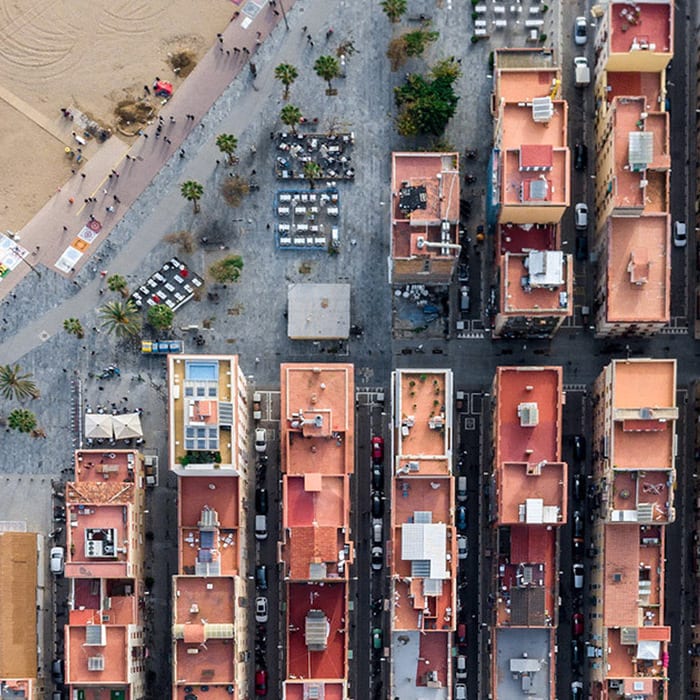 Aerial Photographs Explore the Unique Geometric Patterns of Coastal Barcelona
