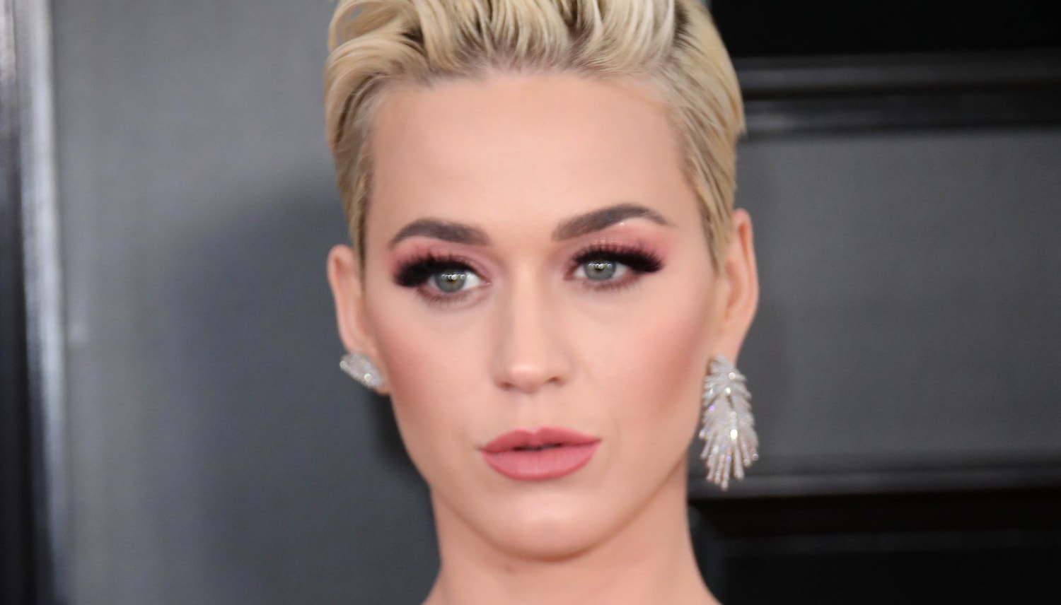 Katy Perry says she isn't 'very close' with former rival Taylor Swift, but 'we text a lot'