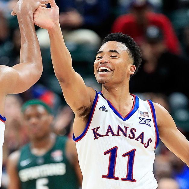 Grimes, Dotson shine in Jayhawks win over Spartans