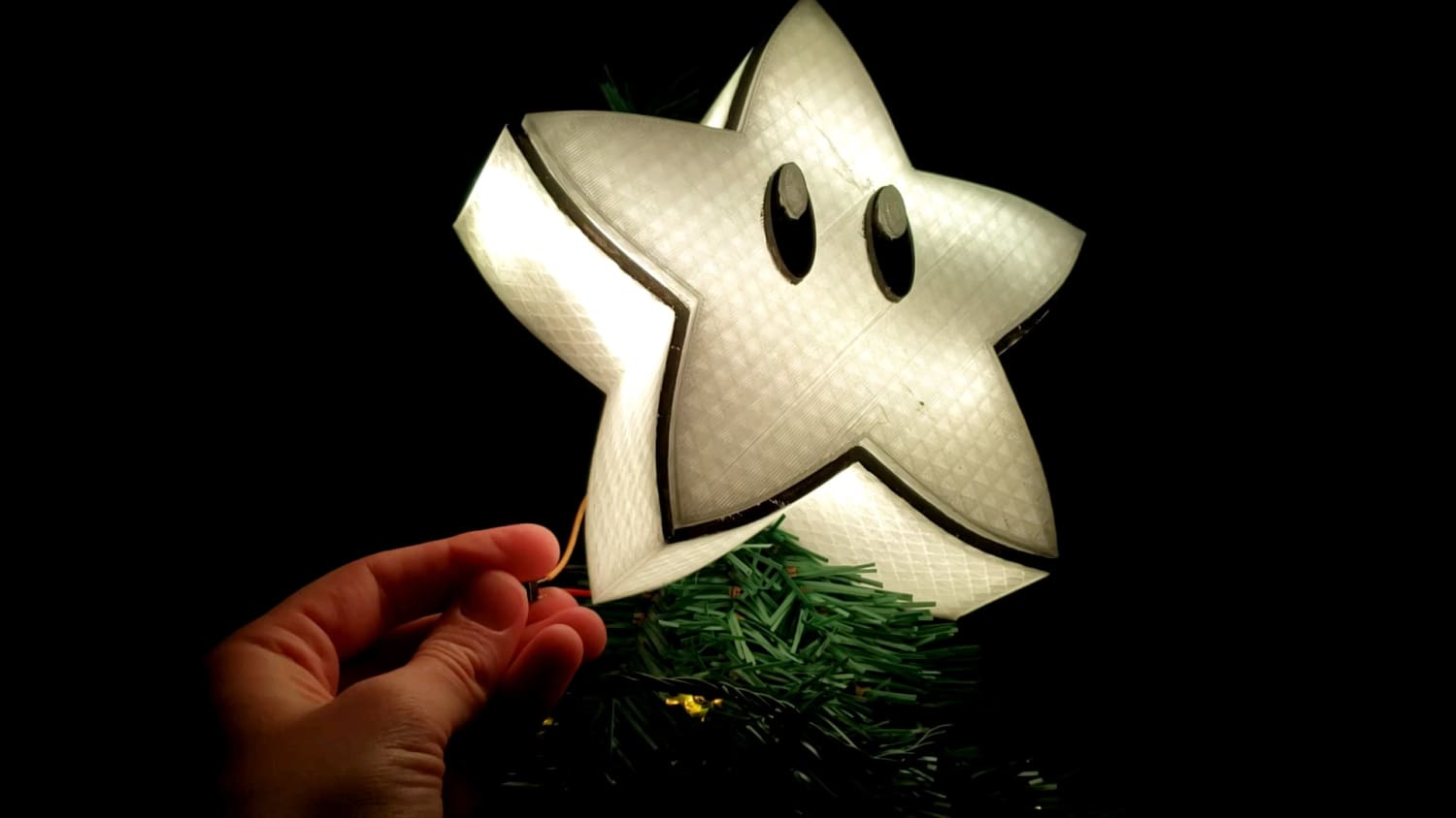Our first 3d designed, printed, and programmed project. The perfect topper to our Christmas tree!