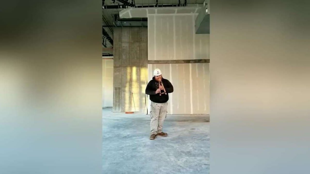 Construction Worker Beautifully Plays The Flute