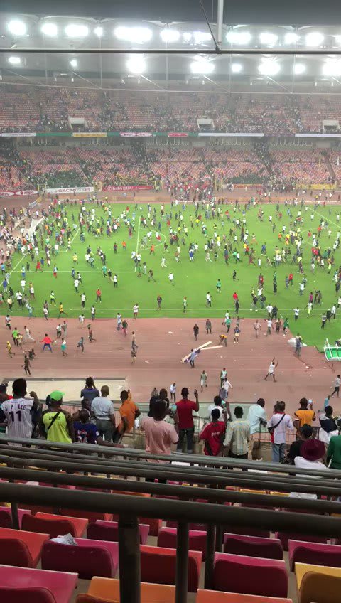 [Odiase] Nigeria fans invade the pitch and vandalize it after failing to qualify for the world cup