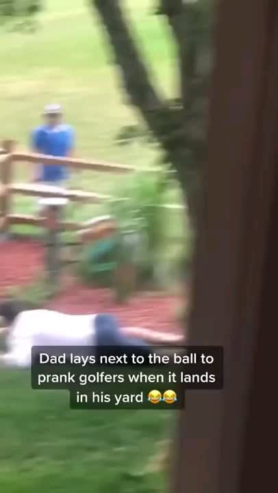 Dad lays next to the ball to prank golfers