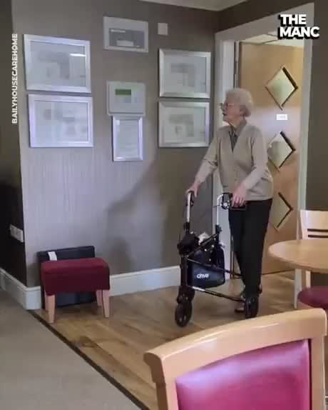 Old man surprises wife by moving into her assisted living home after being kept apart by recent events