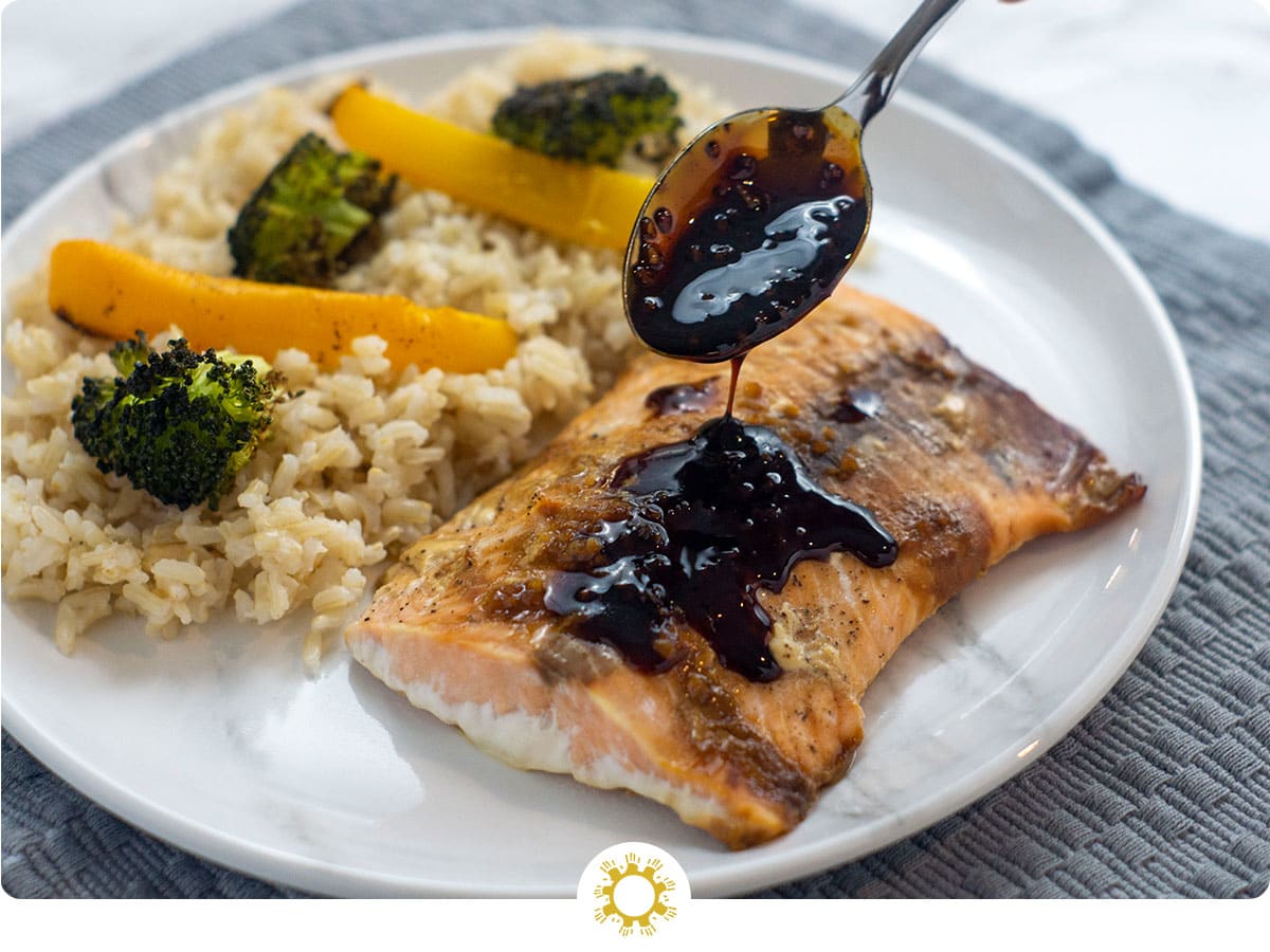 Salmon with a Bold Soy-Molasses Glaze over Rice and Vegetables