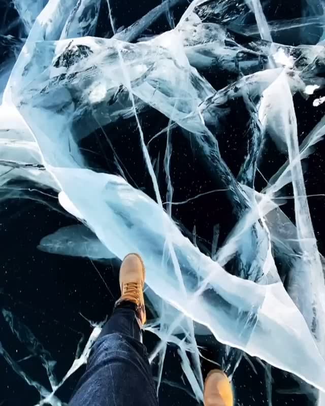 Walking on Frozen Lake Baikal in Siberia