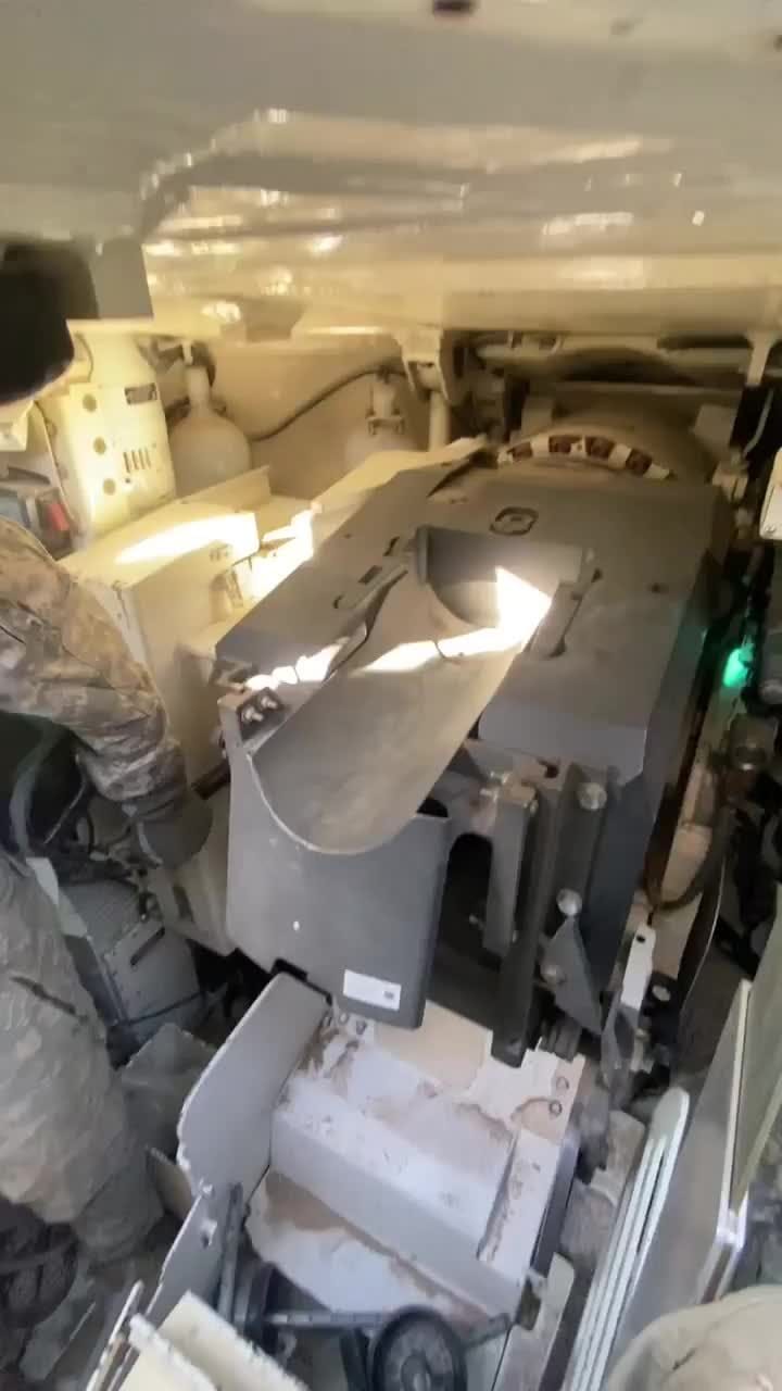 Interior view of an M1A2 Abrams firing from the Tank Commander’s seat ...