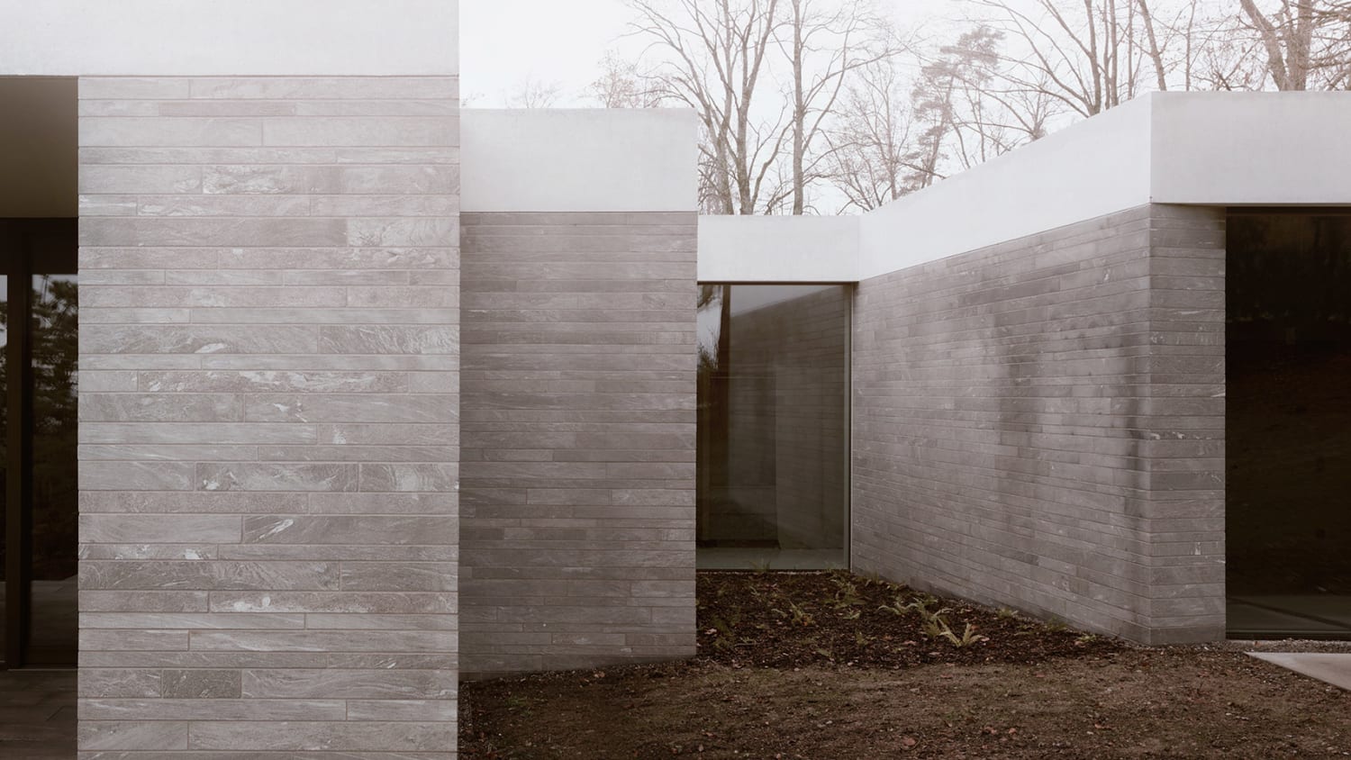 Think Architecture creates minimal hilltop house in Switzerland