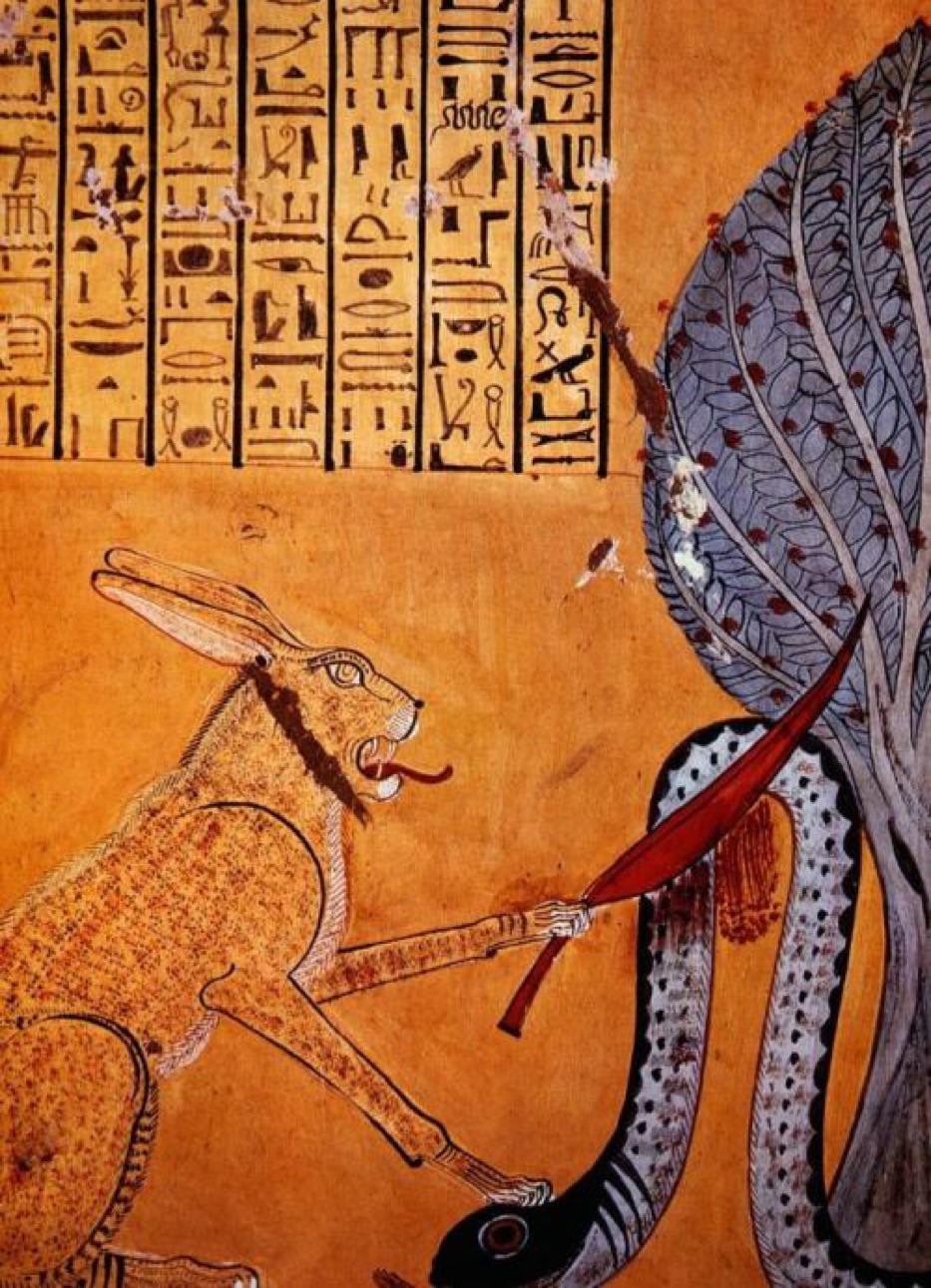 Under a sacred sycamore the sun God Ra, in the form of a cat, slays the snake Apophis, God & demon of the underworld and symbol of the forces of chaos & evil. Detail of a wall painting from the tomb of Inherkhau. New Kingdom, 20th Dynasty, ca. 1080 BC. Deir el-Medina, West Thebes, Egypt.