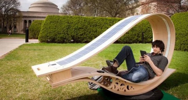 This chair created by MIT that serves as a chair that provides shade, and a solar panel that you can charge your phone with. The chair also rotates during the day so it always faces the sun and has a reserve power battery for the night or cloudy days.