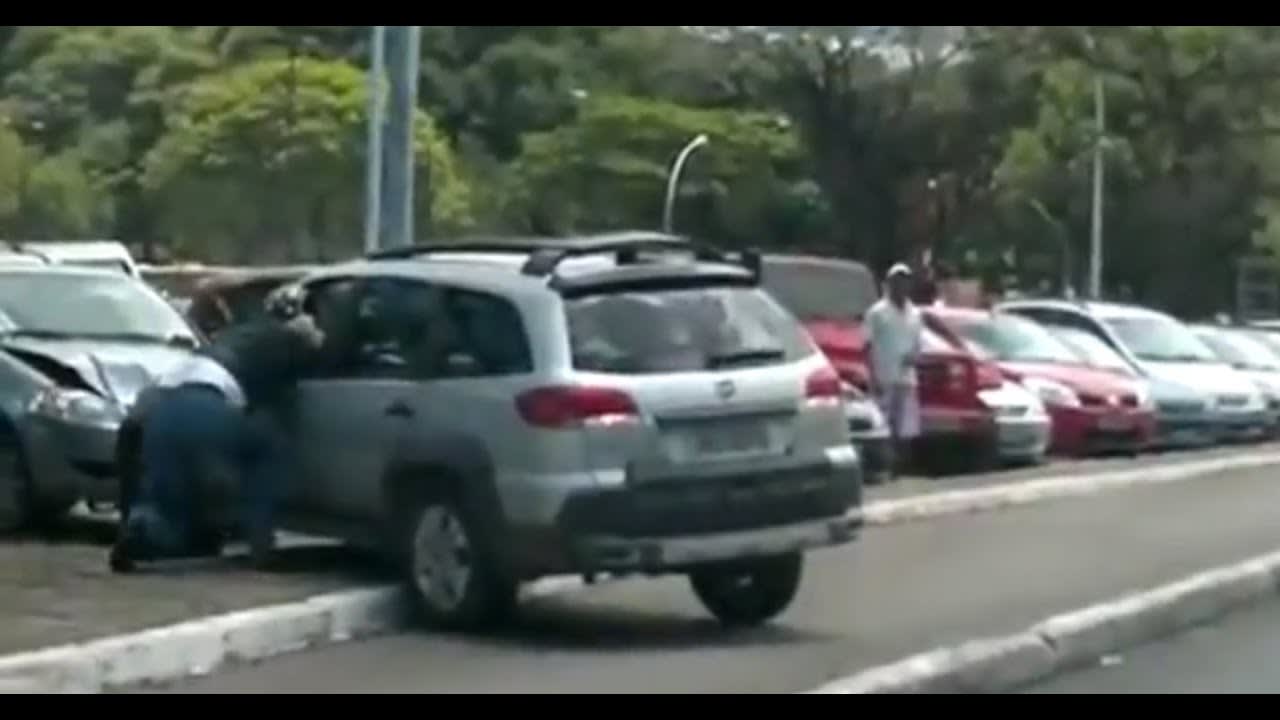 Kicking a car on a motorcycle