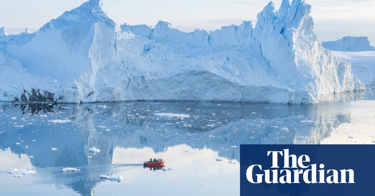 Rain falls on peak of Greenland ice cap for first time on record