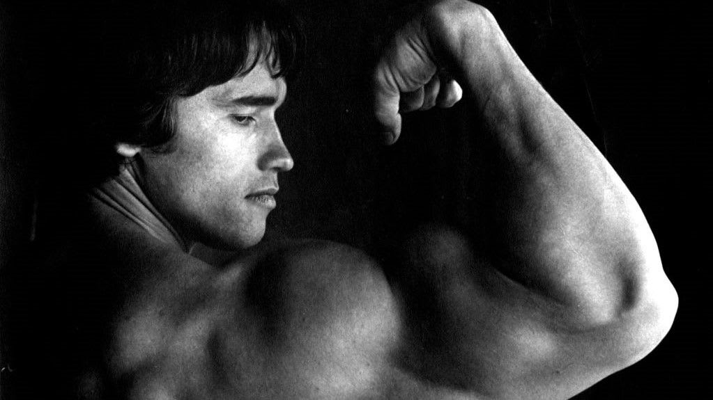 How to get bigger shoulders with a press variation approved by Arnie in his prime