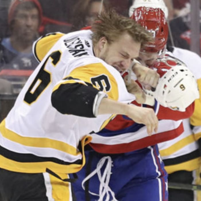 Hockey Enforcer's Punch Answers Rival Executive Who Called Him A Coward