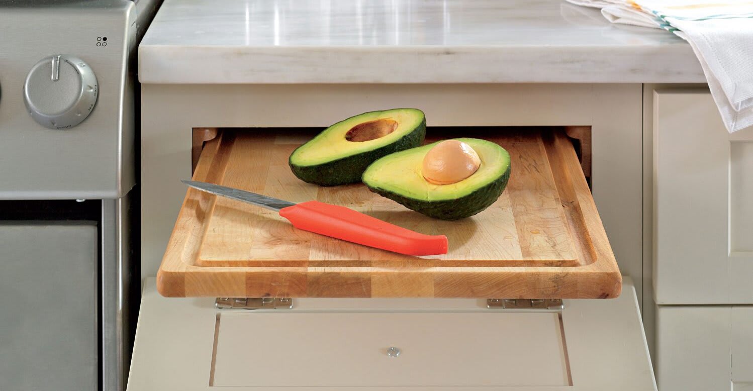 The Real Reason Old Kitchens Have Pull-Out Cutting Boards Will Surprise You