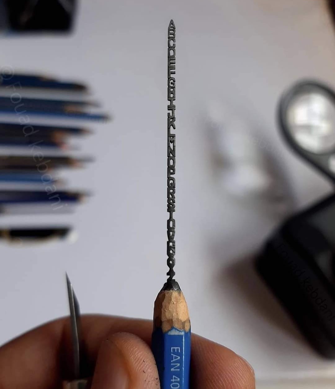 Carving the entire alphabet in pencil lead