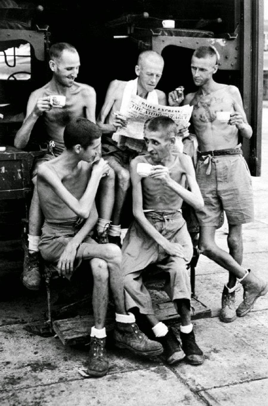 Australian prisoners of war enjoying a cup of coffee after their release from Japanese captivity at the end of World War II, 1945.
