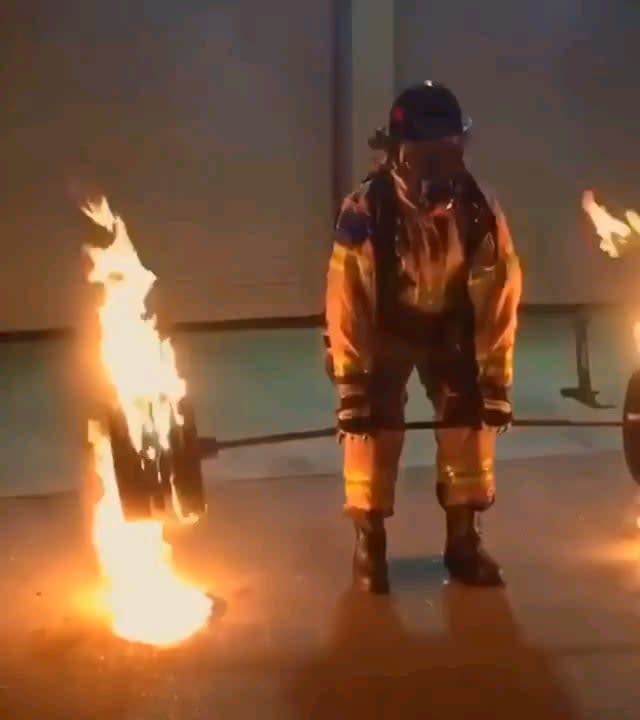 50 year old firefighter dead lifts 600lb of flaming steel to celebrate his retirement