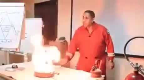 Firefighter demonstrates how to put out a kitchen fire