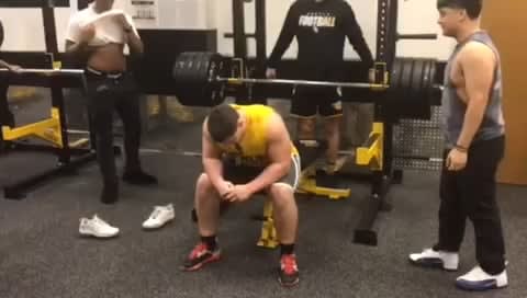 Student breaking a school's bench-press record (385 lbs)