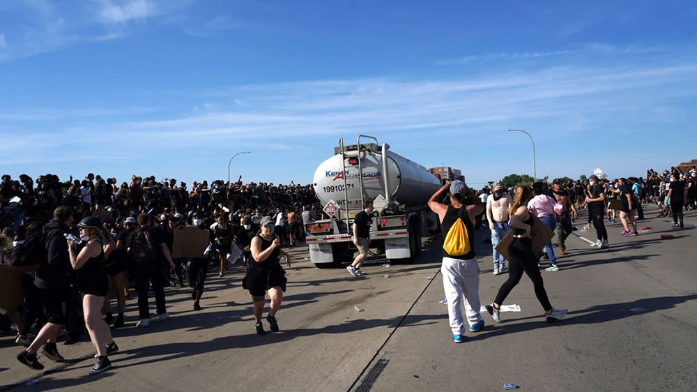 Video shows semi-truck driving through protesters in Minneapolis