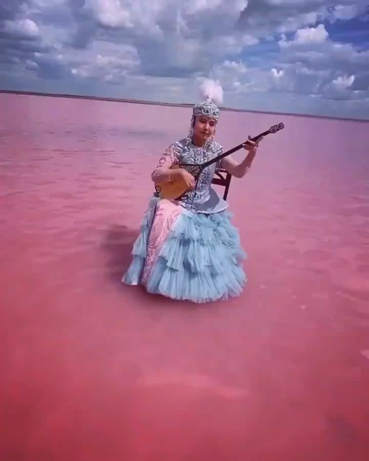 A dombra performance by a 23-year-old Kazakh musician in Lake Köbeituz, a salt lake in Kazakhstan that turns pink every several years.