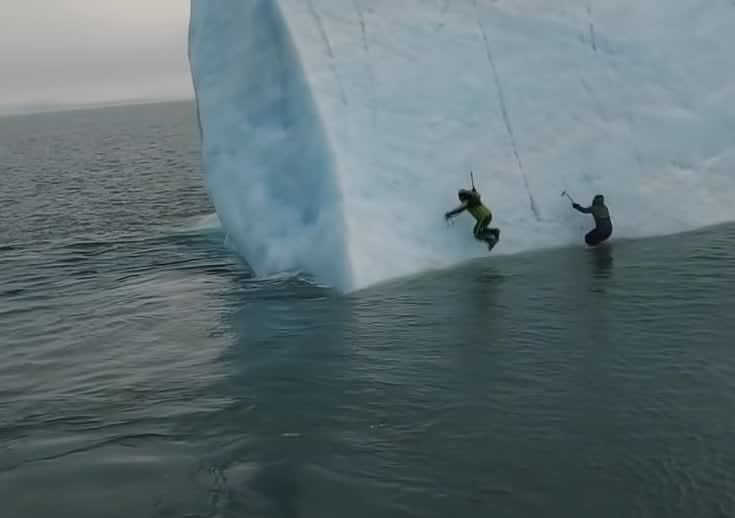 Watch an Iceberg Roll on Experienced Ice Climbers