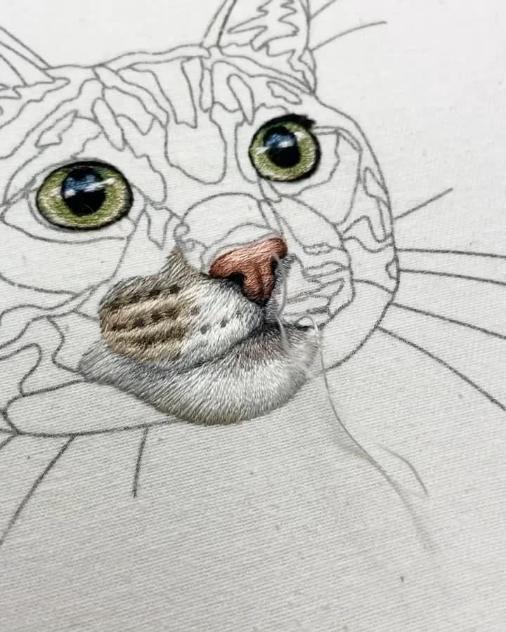 This tabby cat embroidery took 50+ hours and thousands of tiny stitches