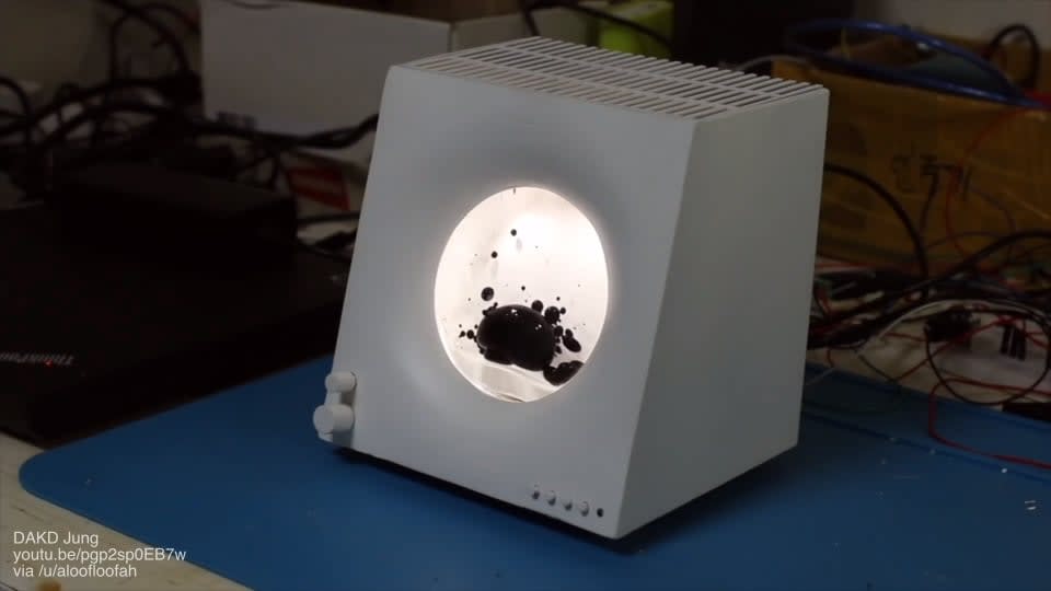 Ferrofluid display cell speaker
