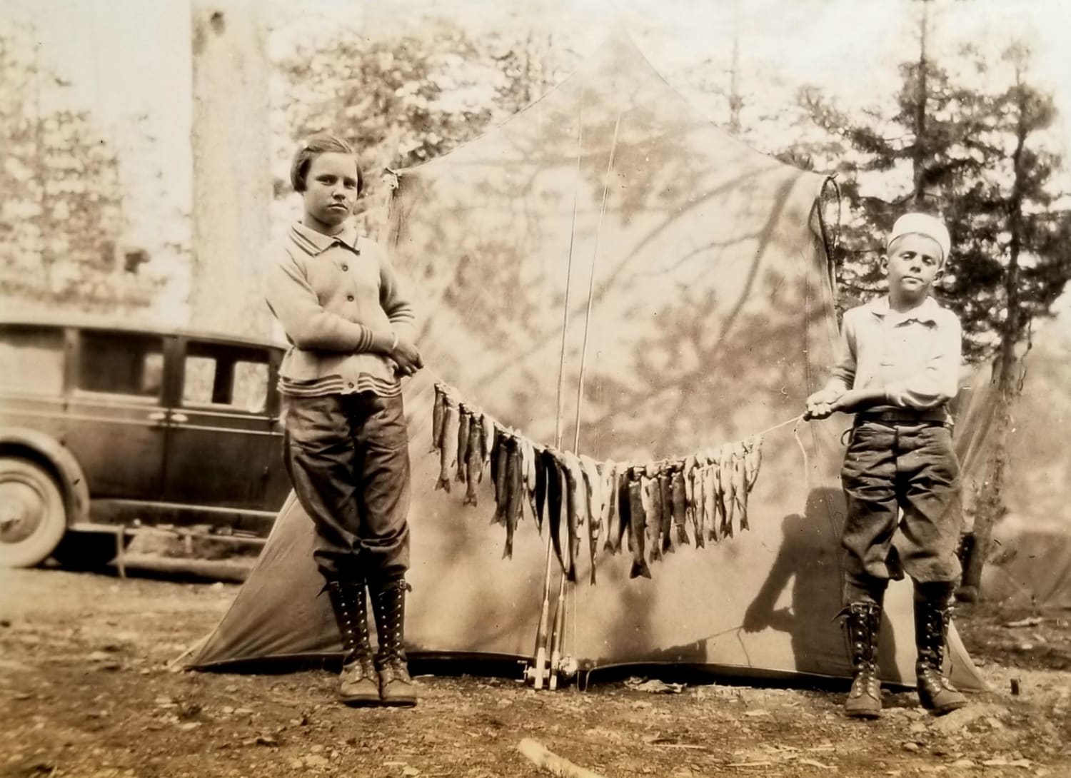 From my vintage photographic collection I found this beautiful photo showing two very happy kids showing off their catch of the day at Salmon Lake, California 1931 enjoy (: