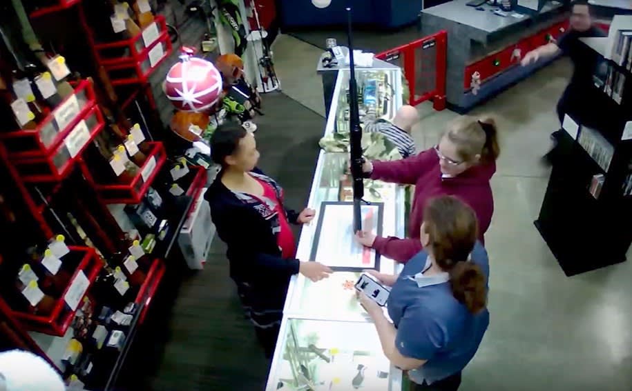 Pawn shop worker saves falling infant while distracted mom shops for shotguns