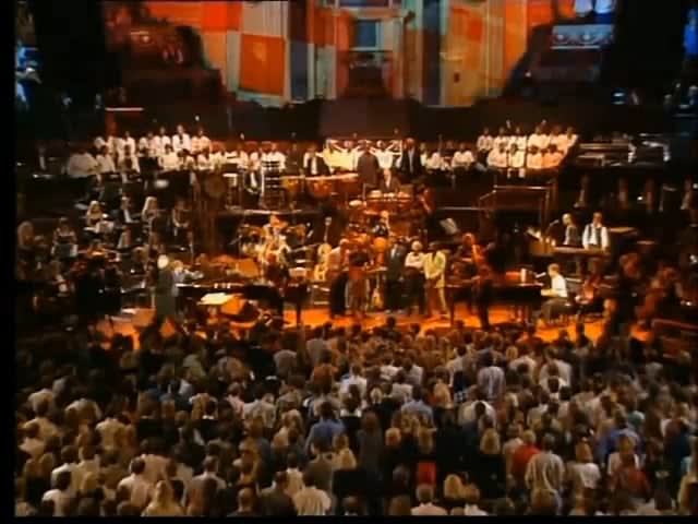 Paul McCartney, Elton John, Sting, Eric Clapton, Mark Knopfler and Phil Collins performing "Hey Jude" in 1997