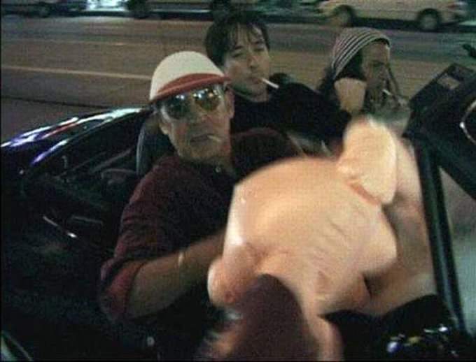 Hunter S. Thompson, John Cusack, Johnny Depp, and a blowup doll. 1990s.