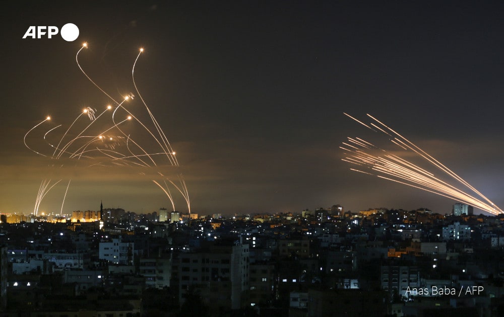 Israel's 'Iron Dome' defence system in action, knocking out Palestinian rockets from Gaza. [AFP - Anas Baba]