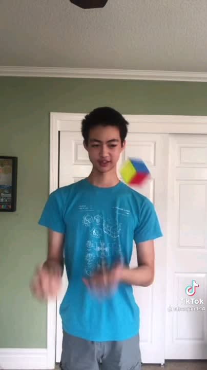 Man recites pi, solves a Rubik’s cube, and juggles at the same time