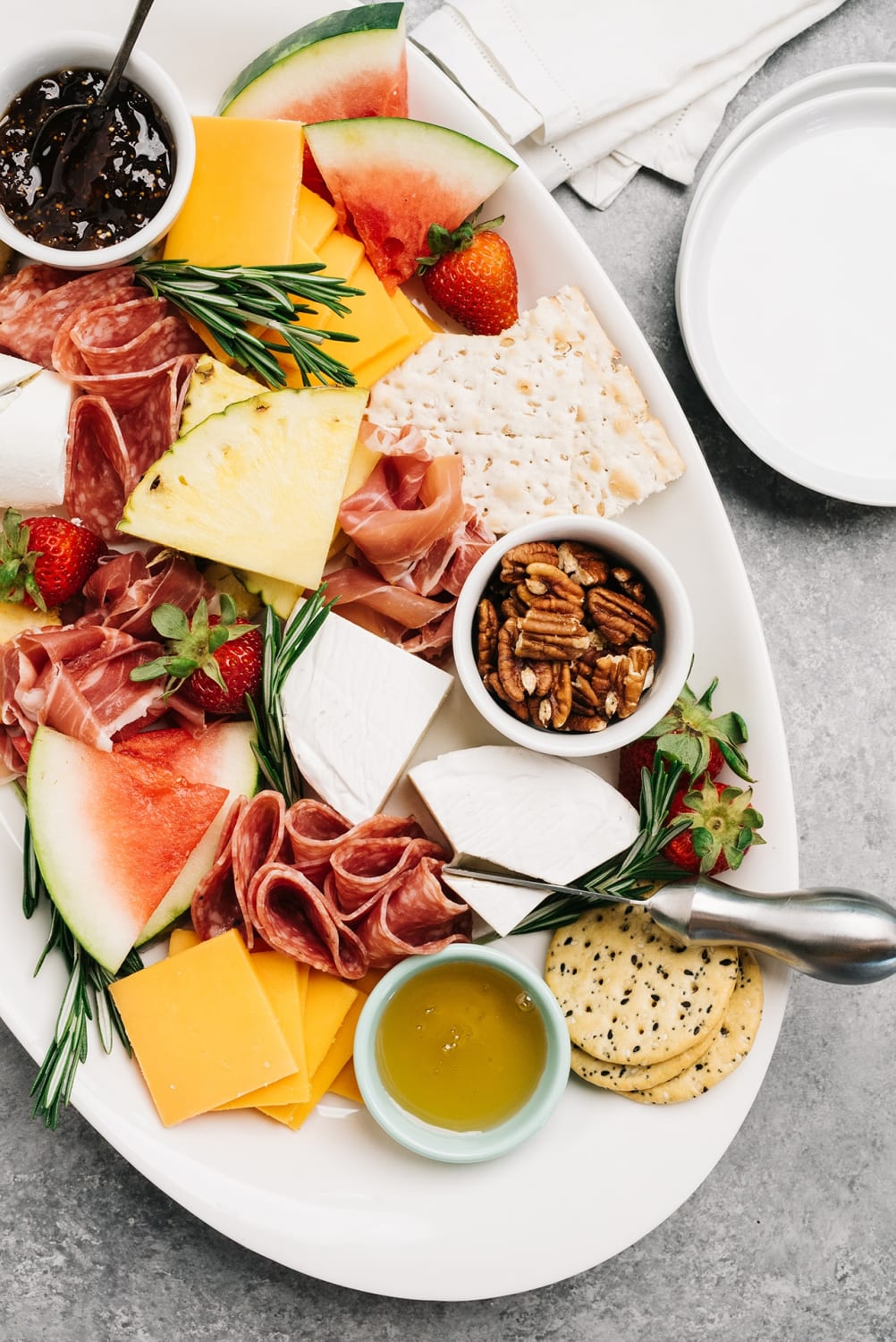Tips & ideas for how to build the ultimate summer charcuterie board!