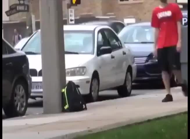 trying to steal a backpack and run
