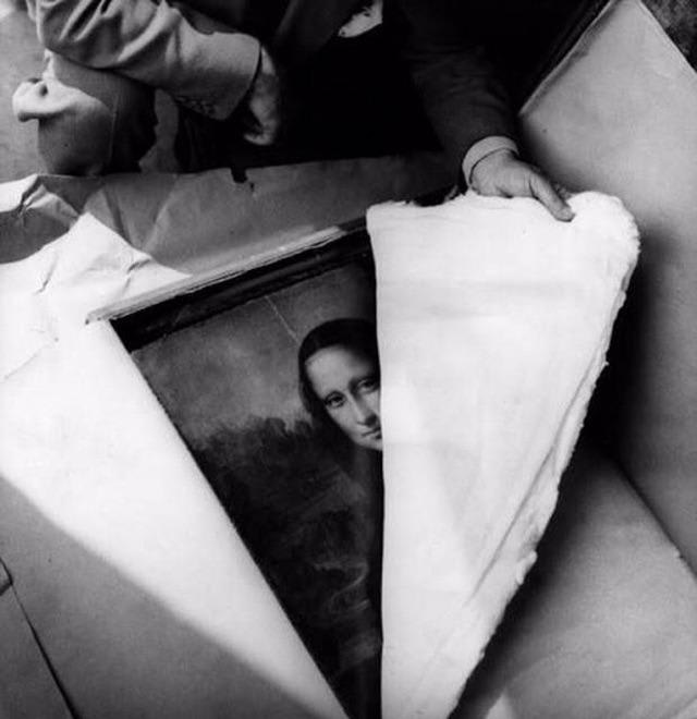 The Mona Lisa painting being opened after being hidden from German troops in 1939
