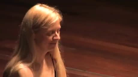The video almost looks sped up during some of the close-ups of her hands. (Valentina Lisitsa, one of the first classical musicians to have a popular channel on YouTube.)