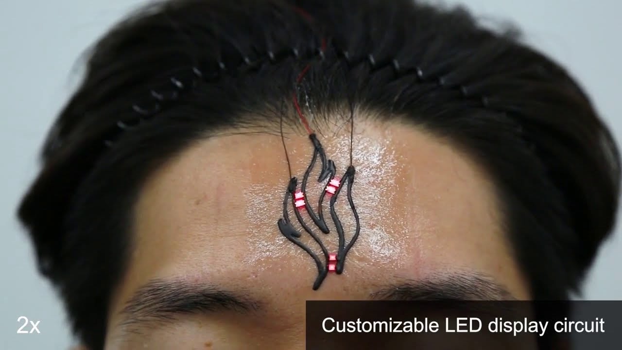 Researchers from KAIST and MIT create a wearable plotting device for fabricating electronic circuits directly on the skin at arbitrary locations