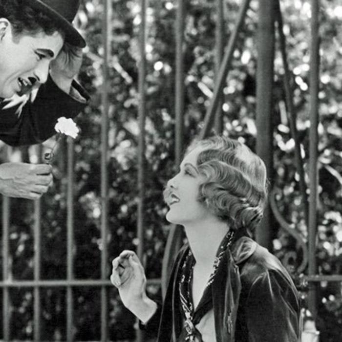 The Tramp meets a flower girl in City Lights - The Kid Should See This