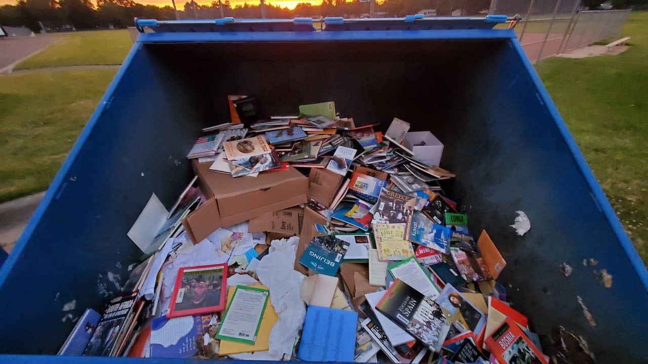 Principal responds after photos of school library books in dumpster cause social media stir