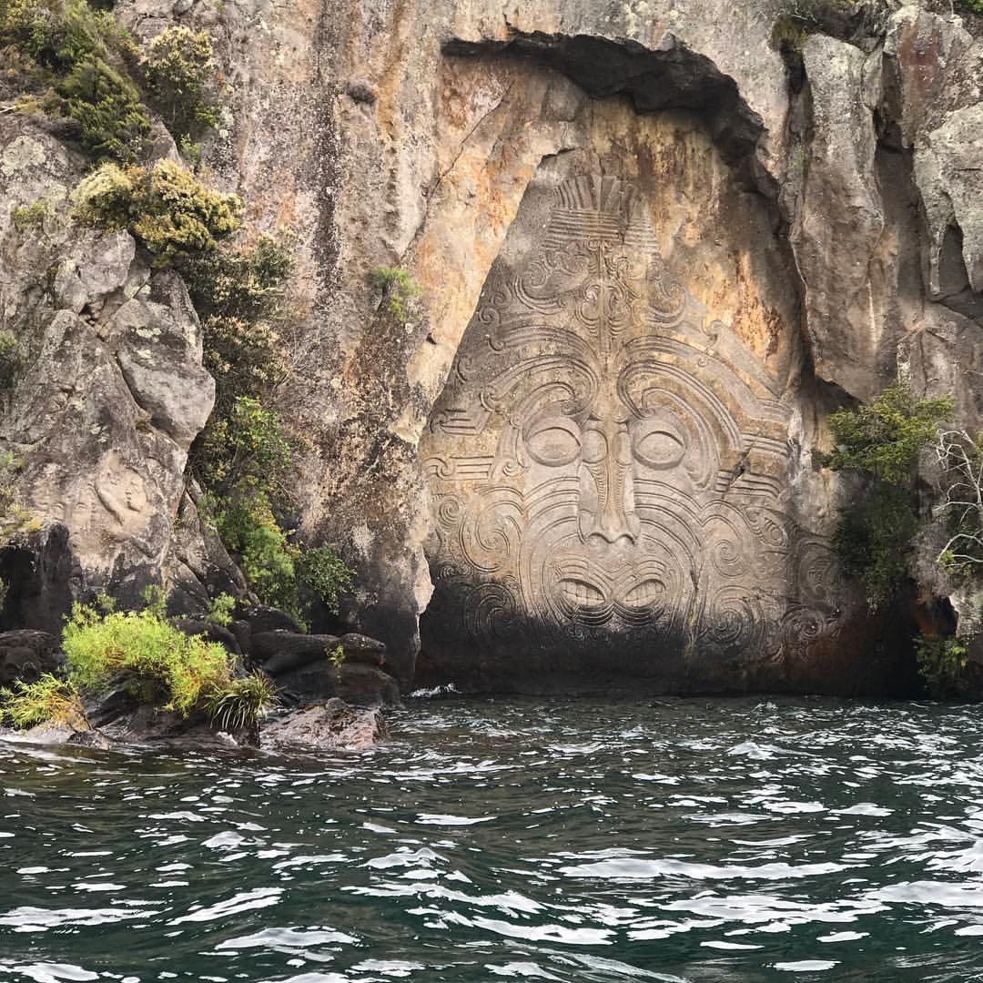 Mine Bay Rock Carvings in New Zealand look like something straight out of an Indiana Jones movie