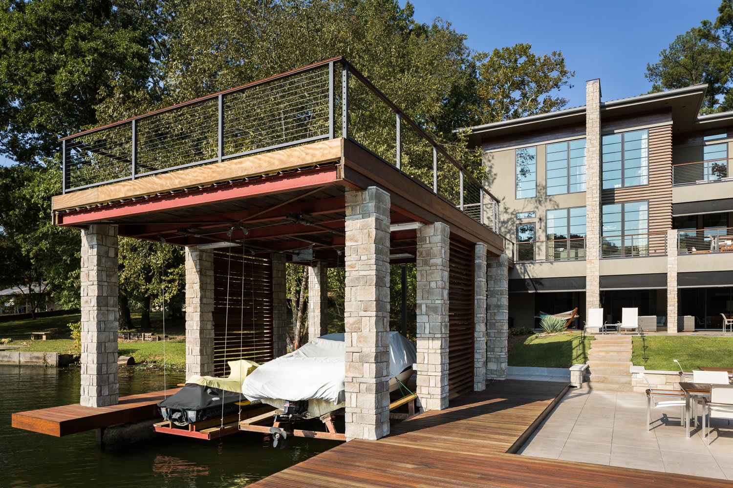 Exotic Woods and Indiana Limestone Drive the Indoor-Outdoor Lifestyle of This Riverfront Home