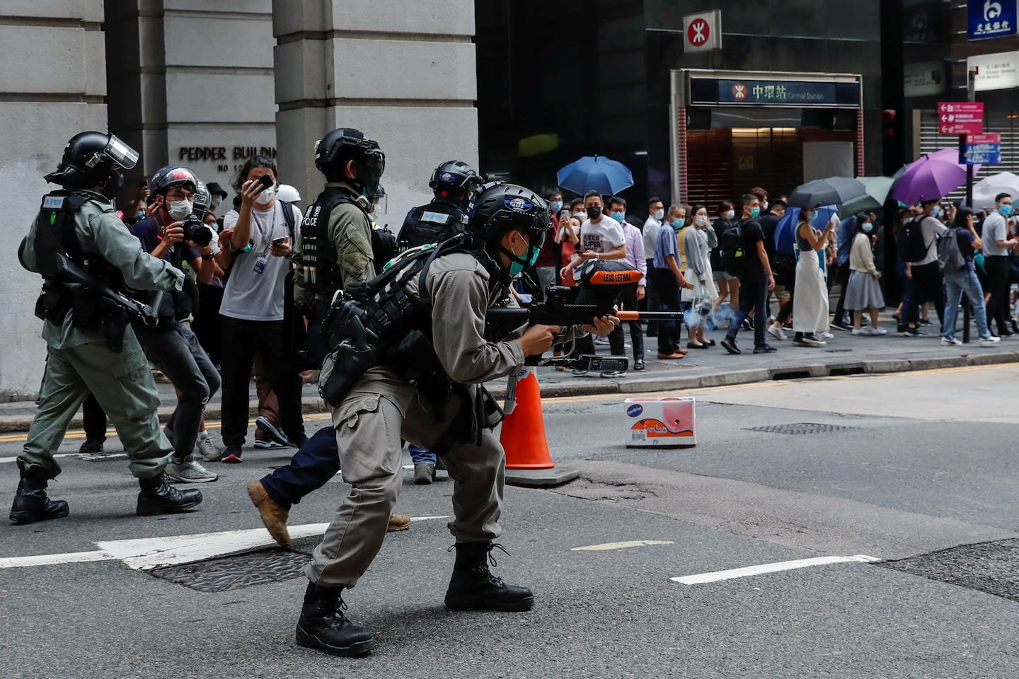 Hong Kong protesters defy police crackdown to resist China’s tightening grip