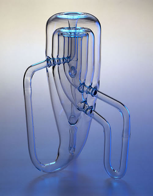 Three Klein Bottles Inside (Outside?) One Another