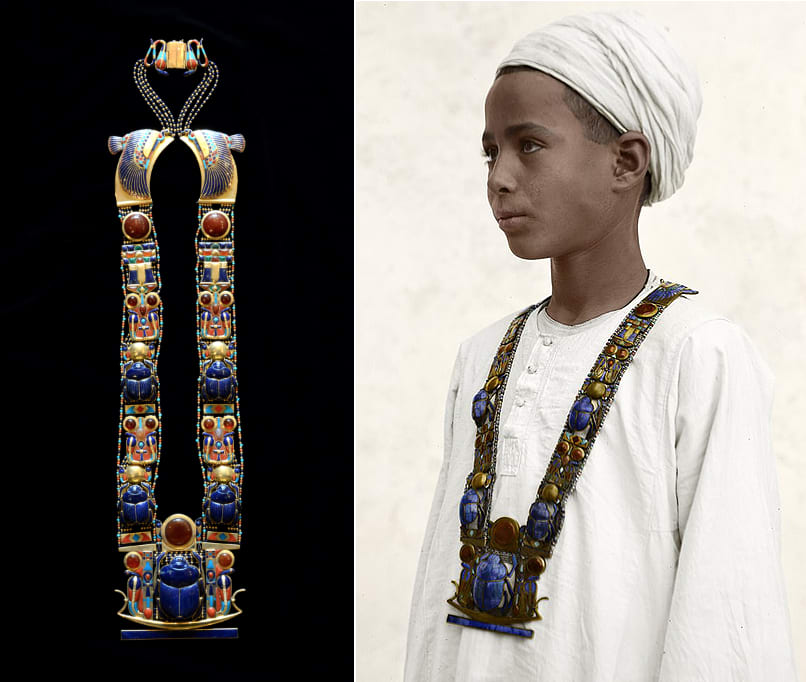 Tutankhamun's gorgeous scarab pectoral pendant ( before 1323 BC ) worn by a local egyptian boy, who might be Hussein Abdel Rassoul, the boy who it is said found the stairway to the tomb, shortly after it's discovery in the 1920s