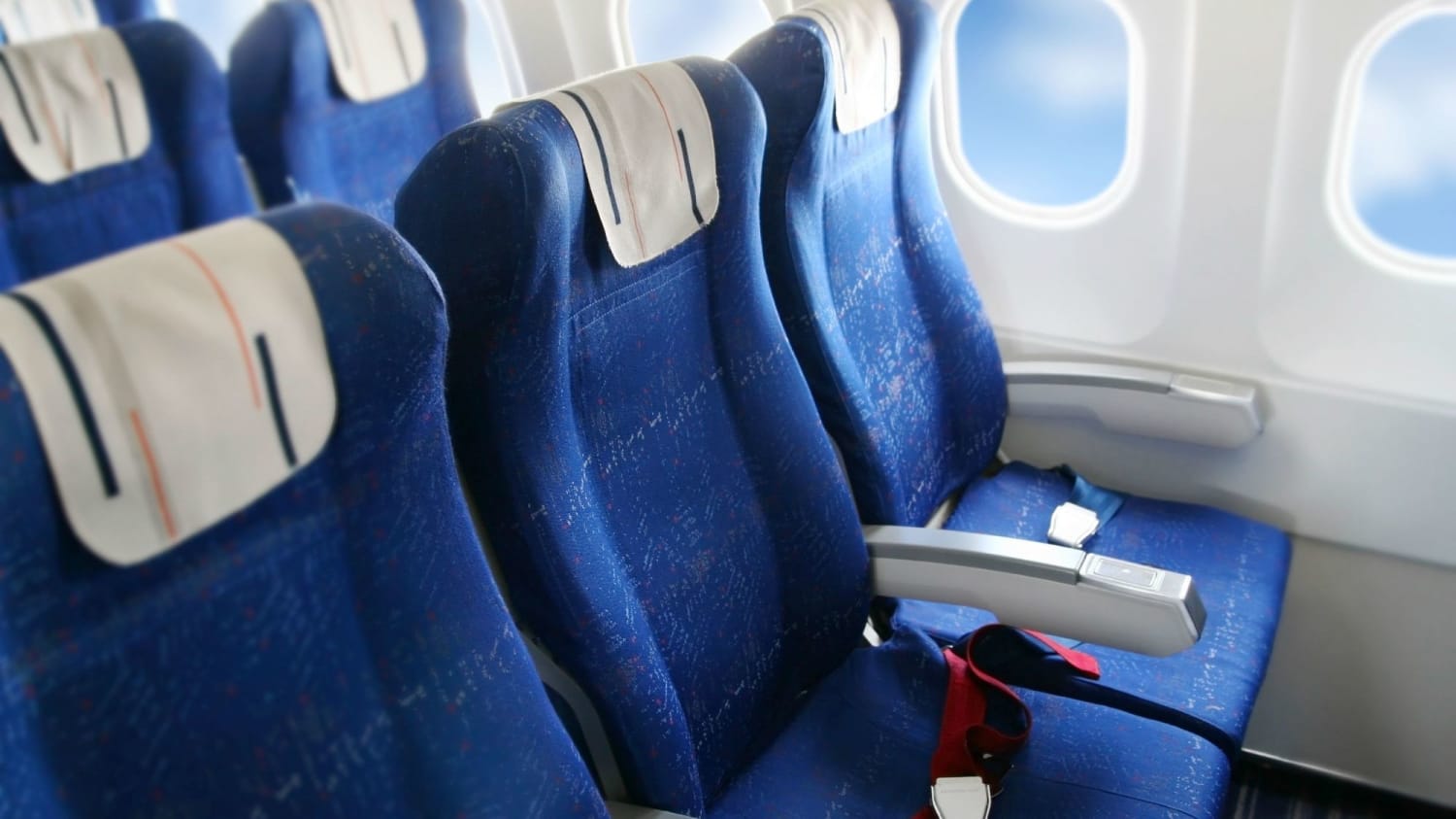 The Reason Why Airplane Seats Are Blue